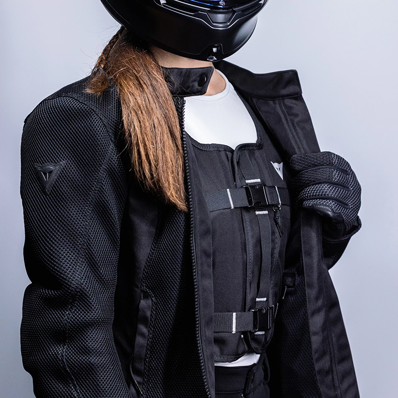 Lady wearing Dainese Smart GO airbag vest
